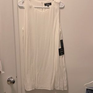 White sleeveless shift dress